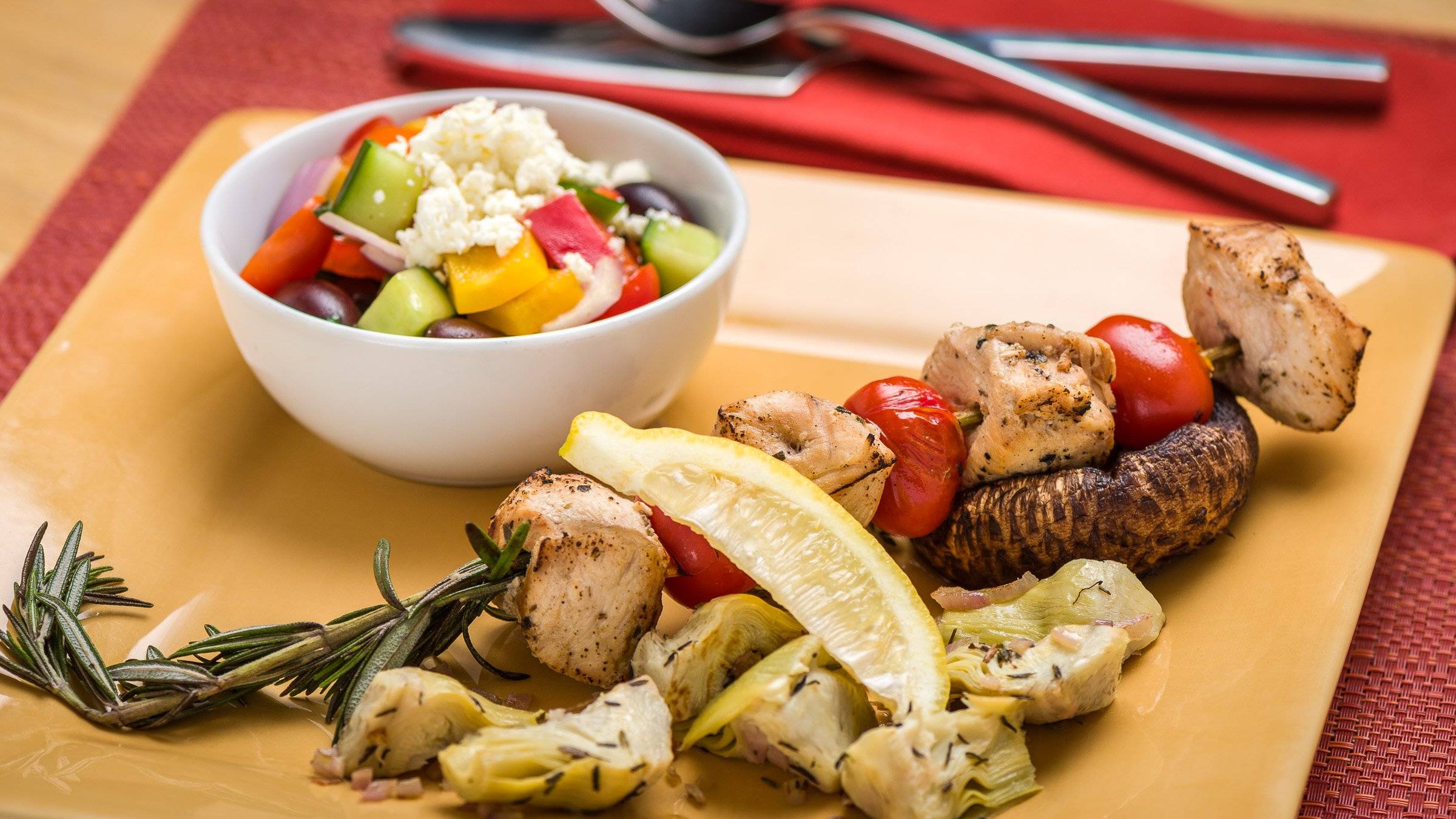 Skewered Greek Chicken on Portobello Mushrooms with Artichokes