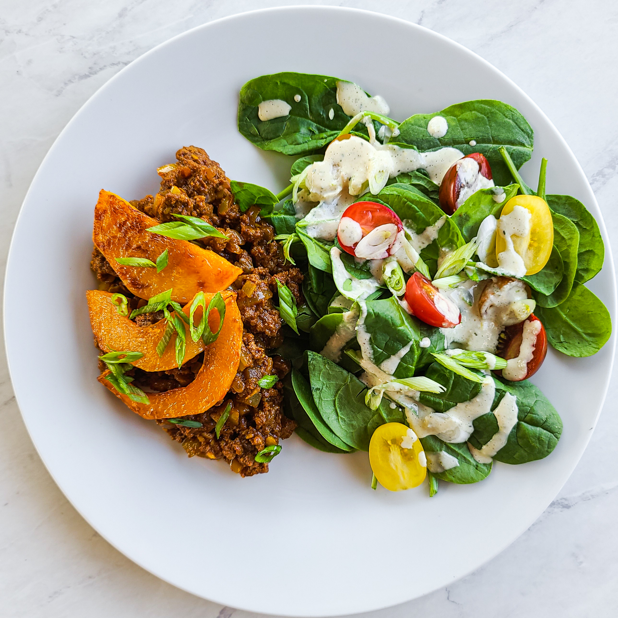 Moroccan Spiced Beef with Roasted Butternut Squash & Baby Spinach Salad with Hemp Seed Tahini Dressing