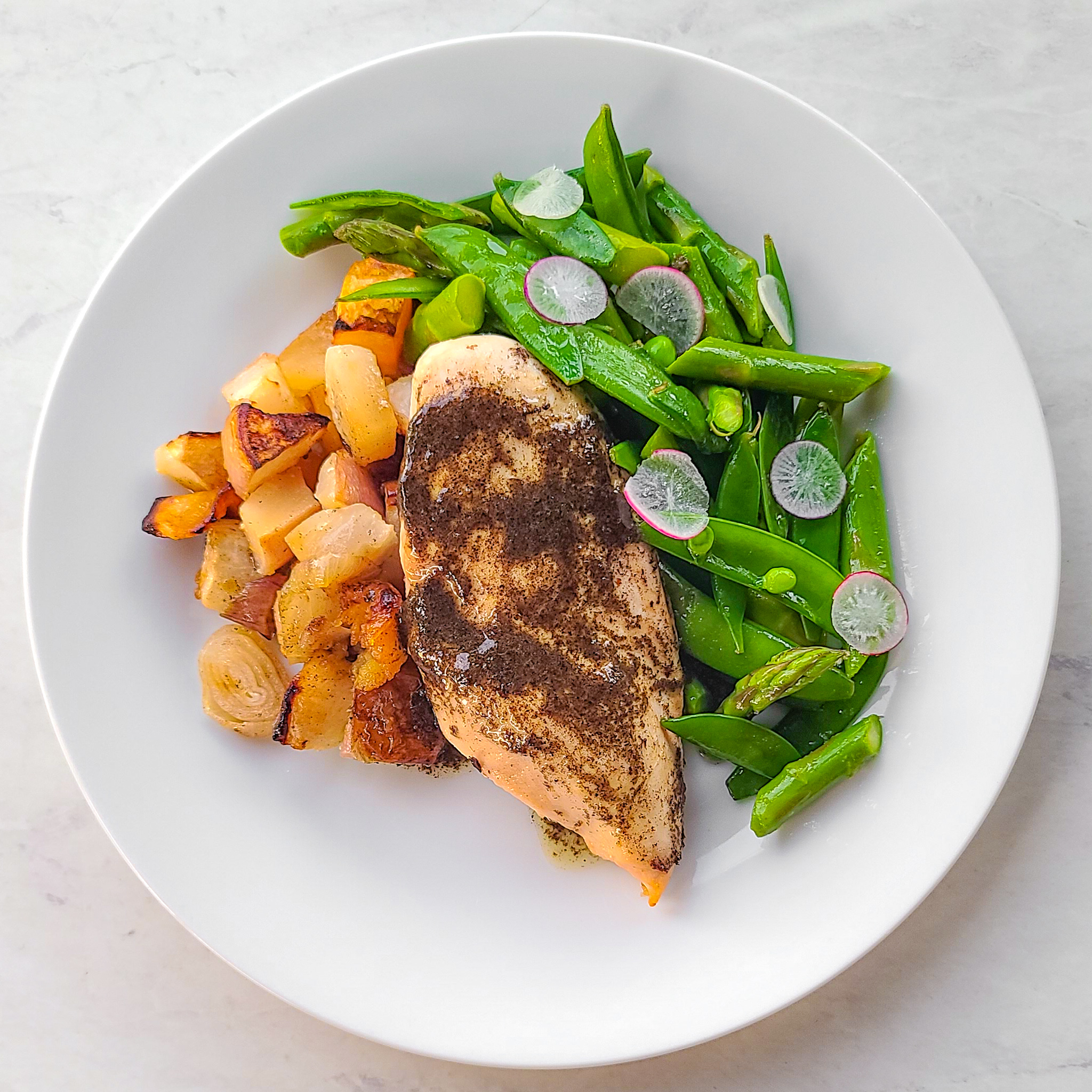 Chicken Breast with Charred Scallion Vinaigrette Over Roasted Shallots & Turnips with Sautéed Spring Vegetables