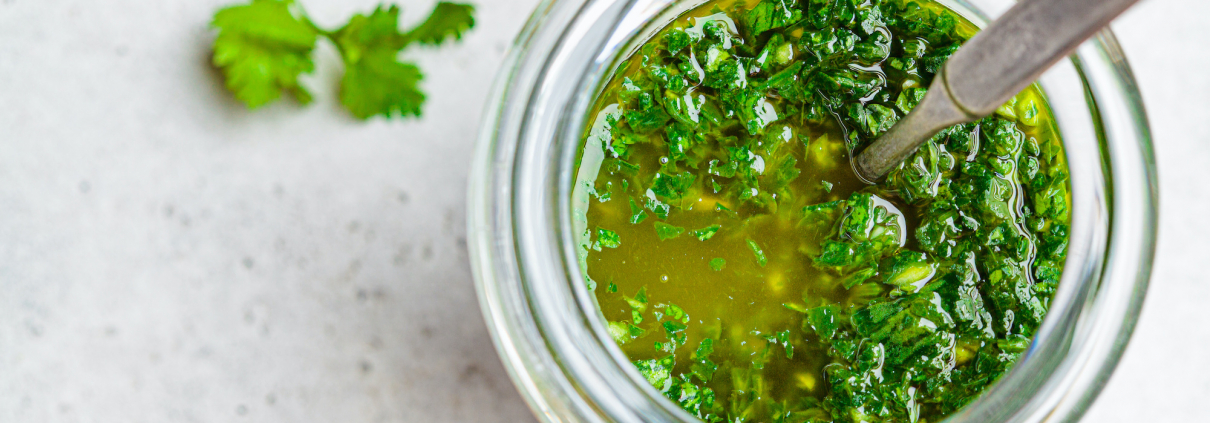 bow of chimichurri Vinaigrette with onions and parsley