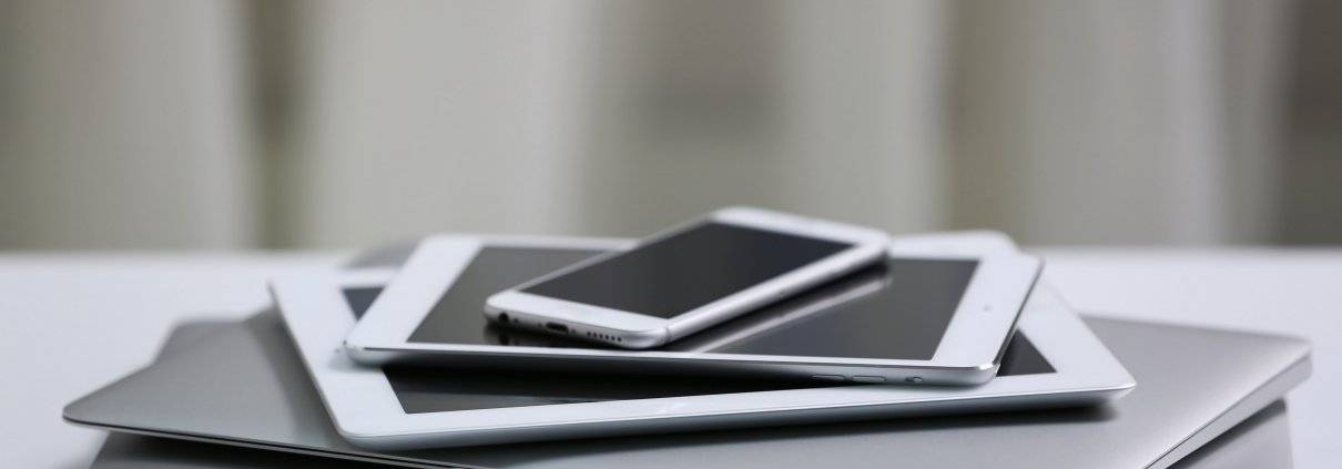 Digital Devices Stacked on Table Digital Detox