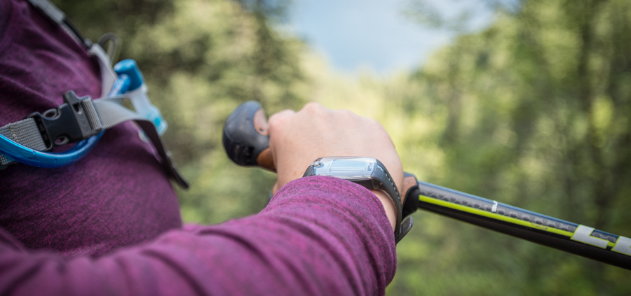 looking at wrist watch in nature