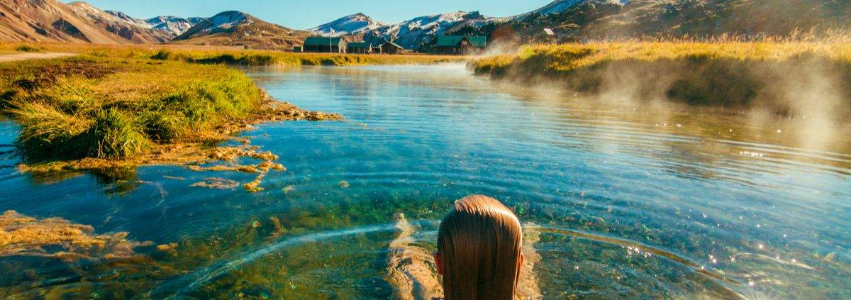 woman sitting in a Hot Spring Canada