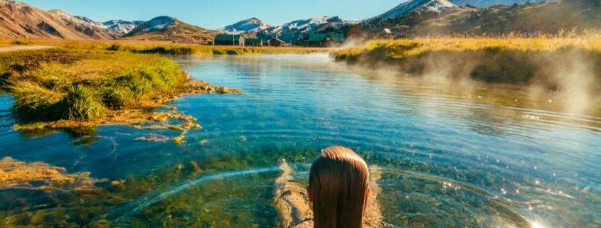 woman sitting in a Hot Spring Canada